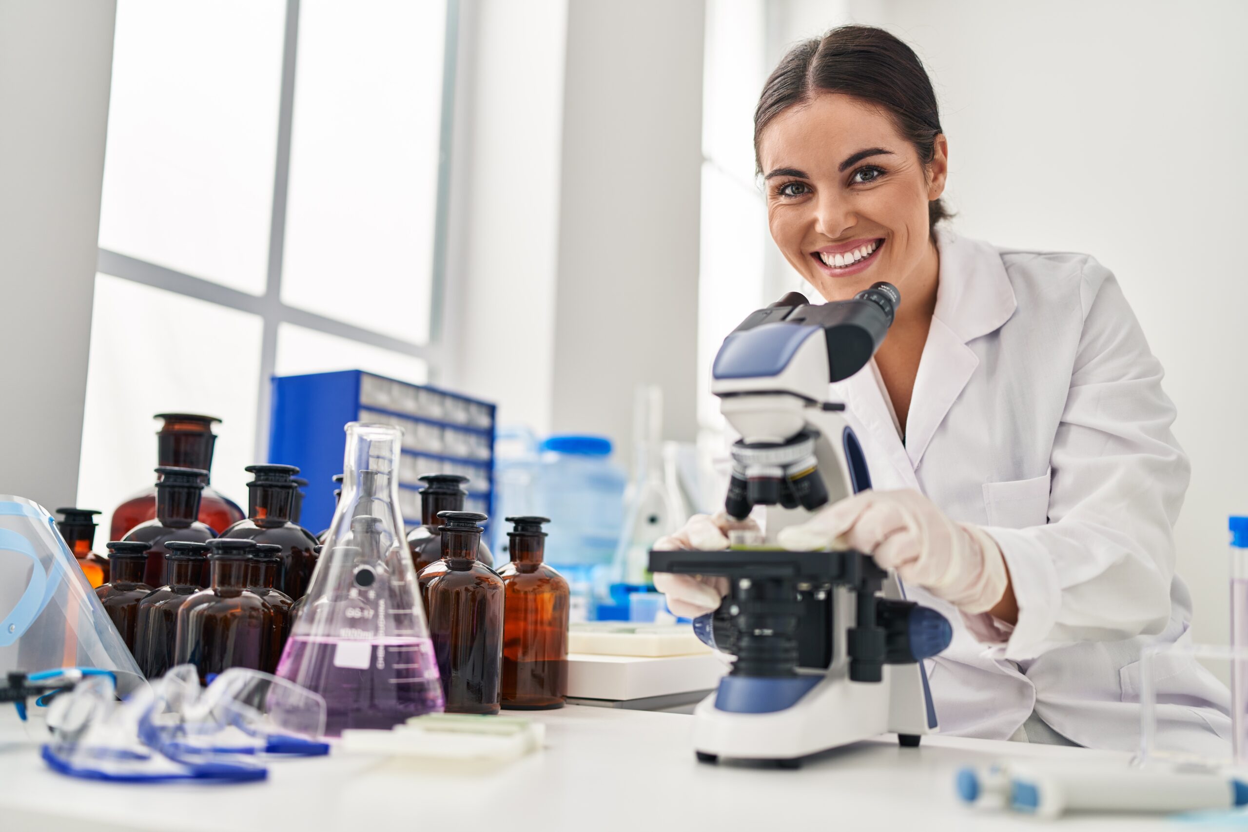 young woman chemist working in a lab