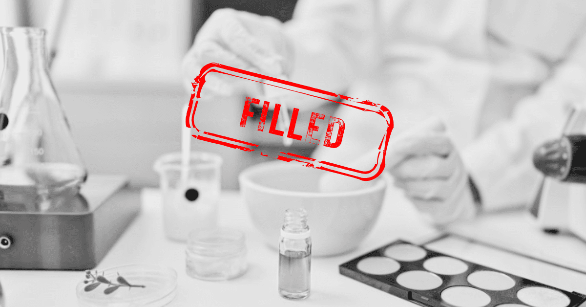 black and white image of a specialty chemicals scientist formulation personal care products with a red stamp overlay that says FILLED