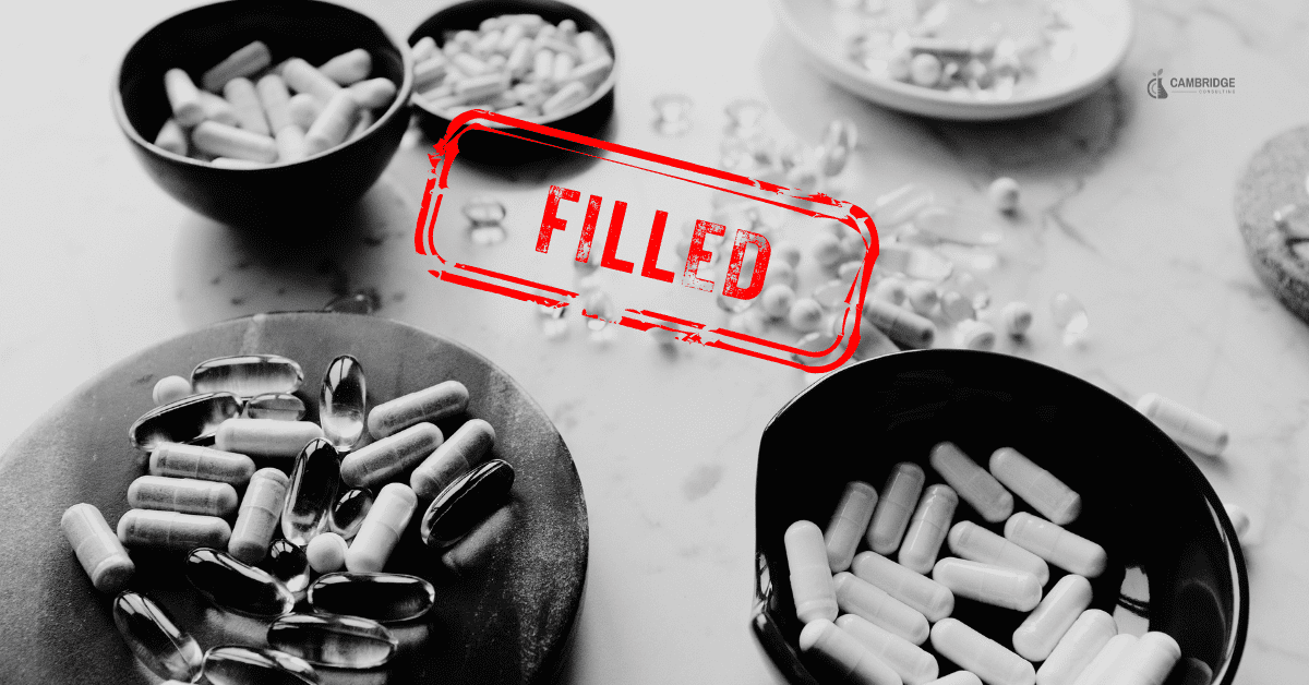 Global Product Portfolio Manager 1777 (1) black and white image of bowls with various medications in them with a stamp text overlay that says "filled"