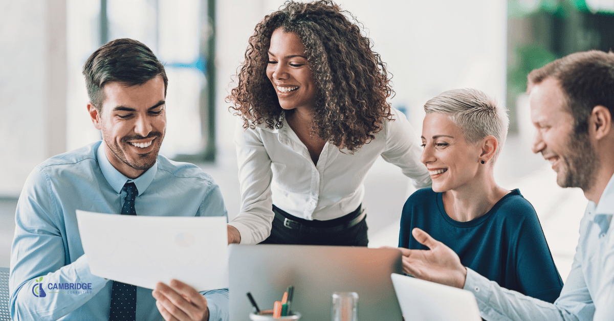 1806 Director of Sales a woman leading a conversation at work