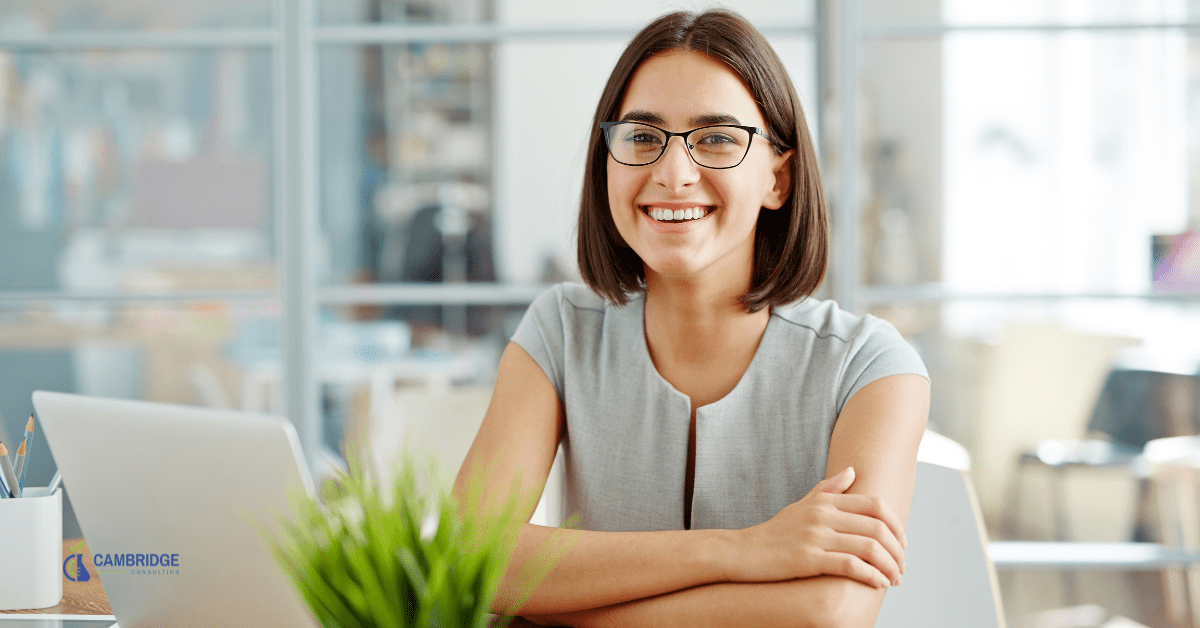BD Specialist 1803 woman smiling at her desk in her office