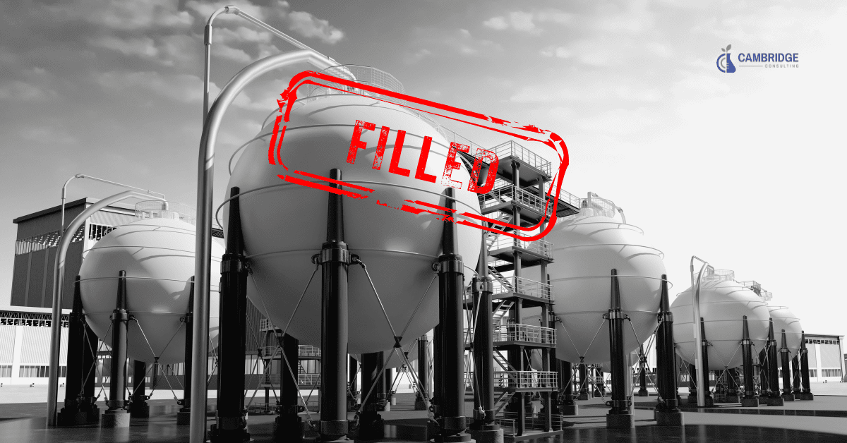a black and white image of a water treatment plant with a red stamp overlay that says "FILLED"