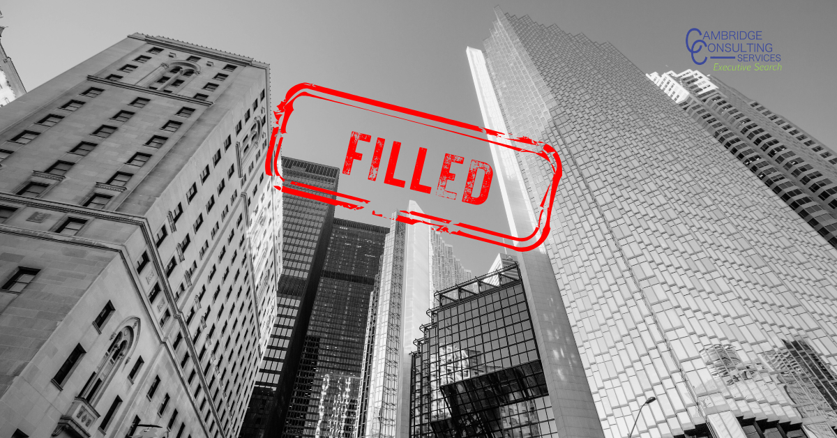 a black and white image of downtown Toronto with a red text overlay that says "filled" in capital letters, with the Cambridge Consulting Services logo in the top left corner